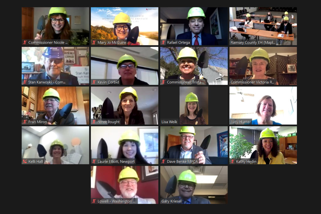 Video call with participants in hard hats